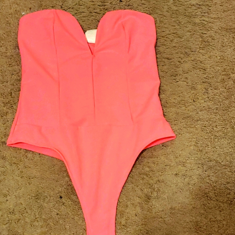 Hot pink body suit